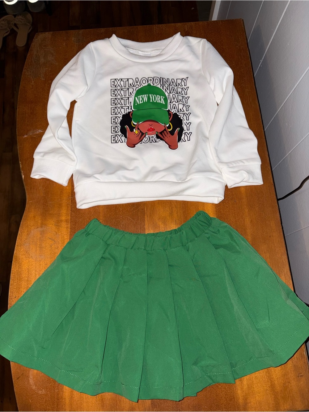 Girls Green Pleated Skirt & White Graphic Sweatshirt Set